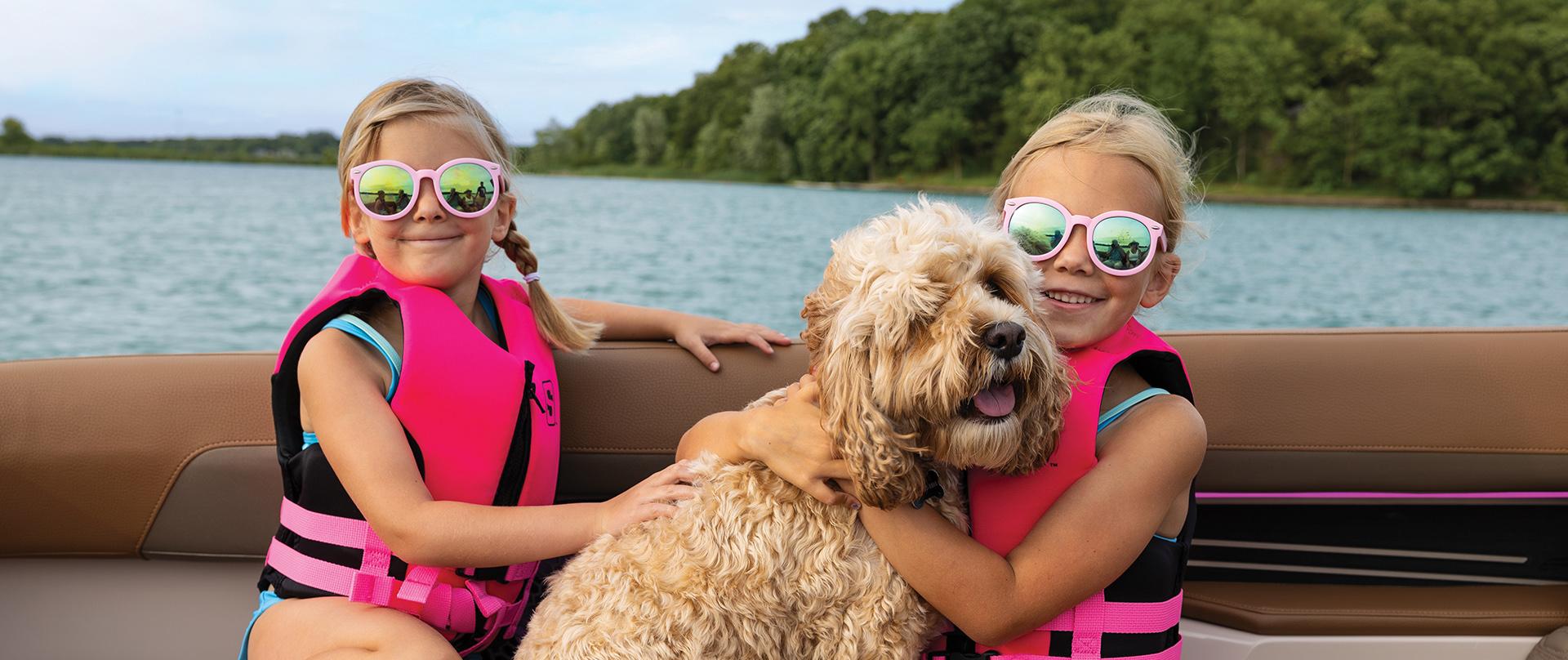 Young girls on a Harris Pontoon Boat